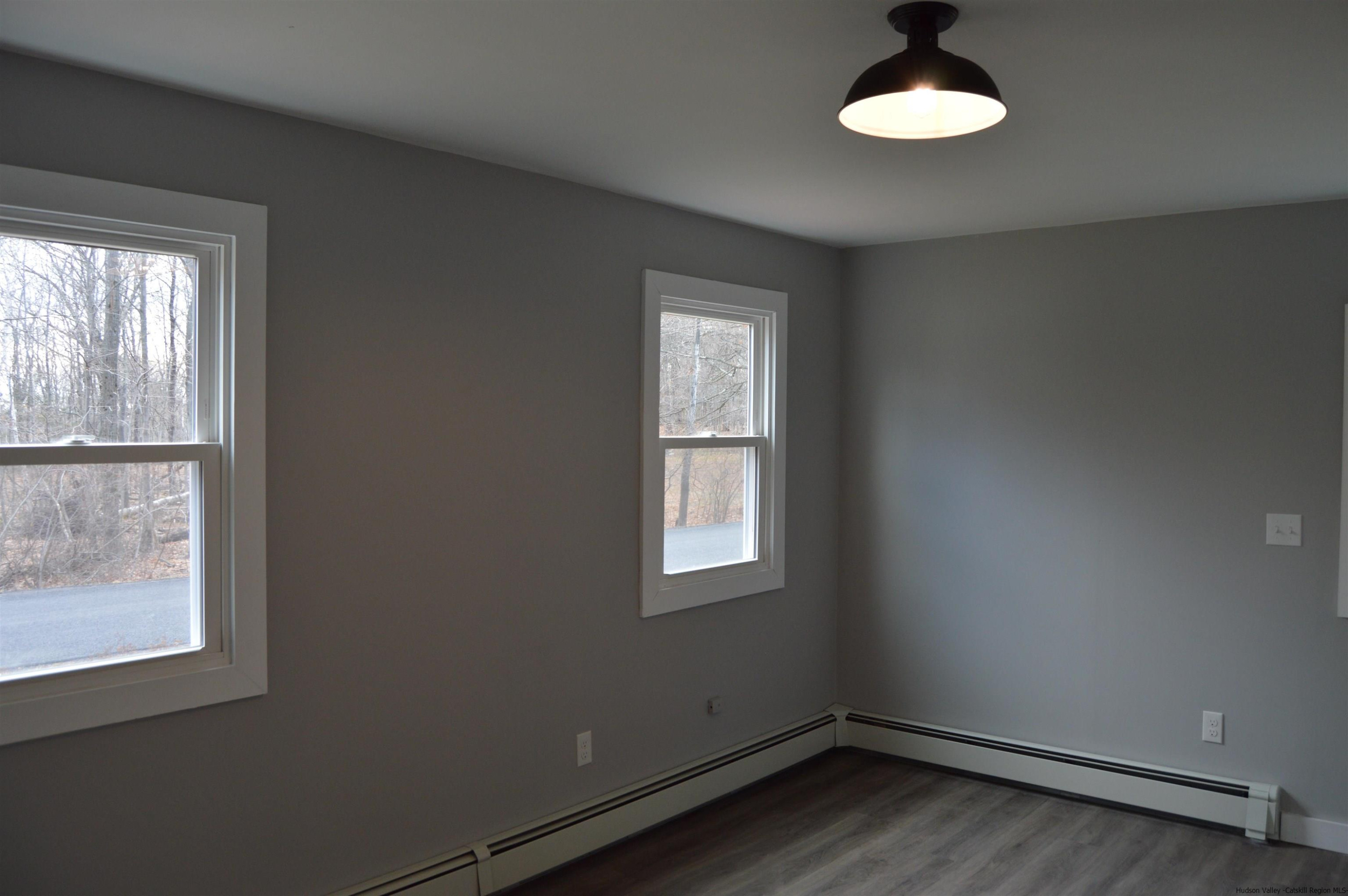 128 Cole Bank Road Saugerties, NY 12477 - Photo 11 of 26 an empty room with a window