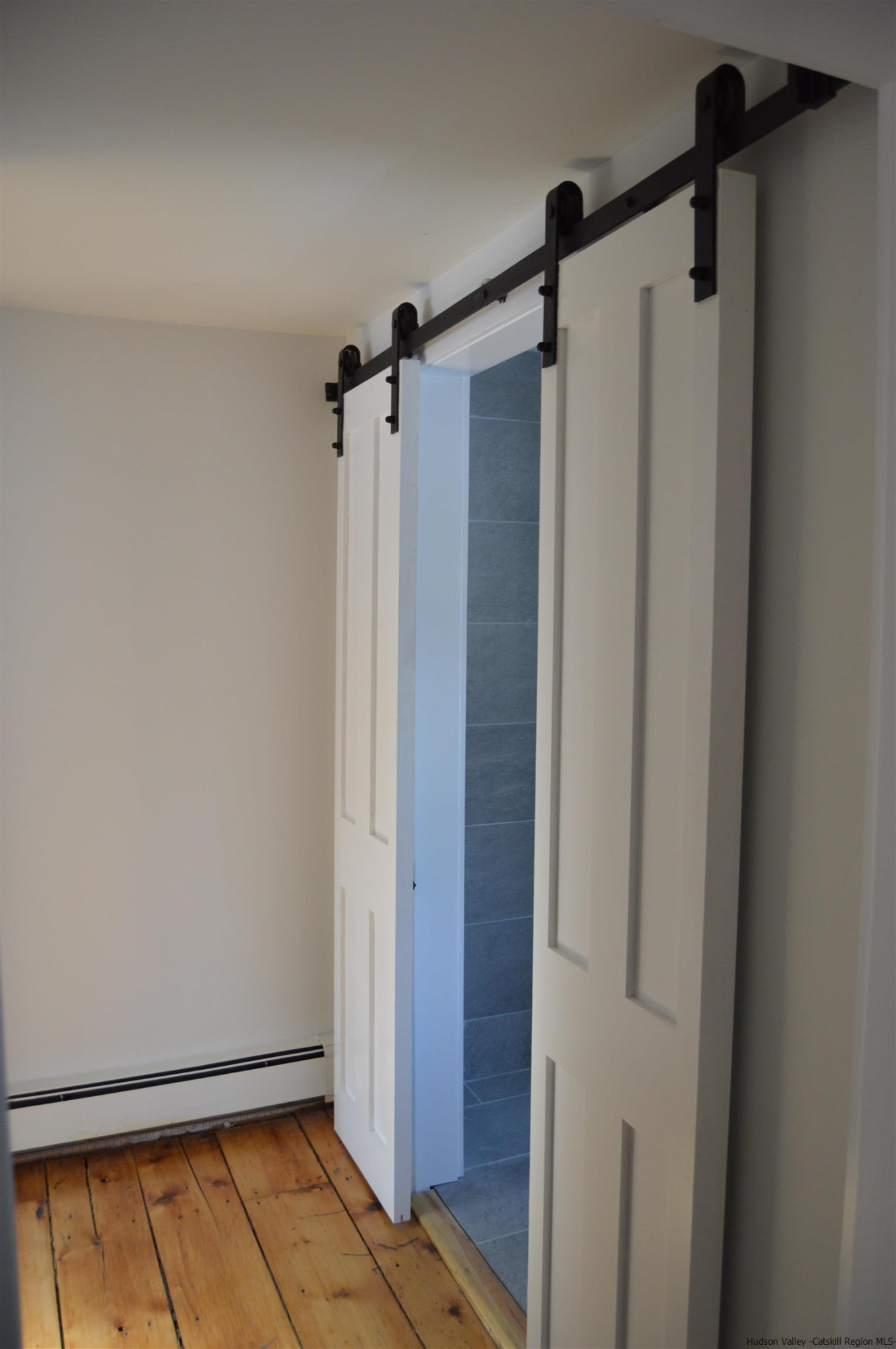 128 Cole Bank Road Saugerties, NY 12477 - Photo 18 of 26 a view of a room with sliding door