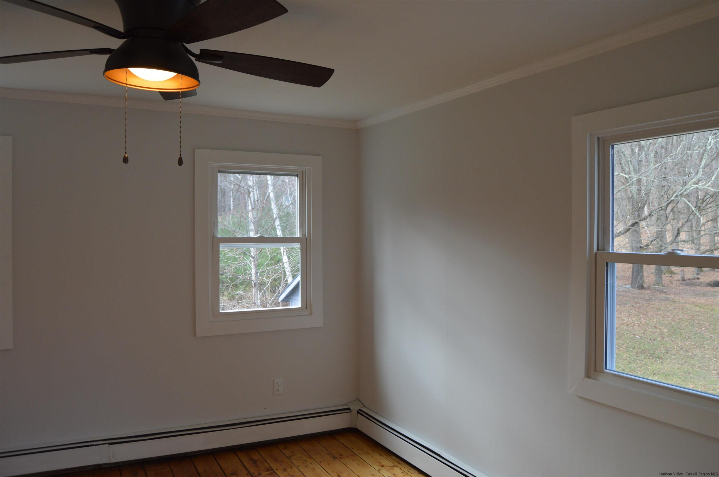 128 Cole Bank Road Saugerties, NY 12477 - Photo 21 of 26 a view of an empty room with a window