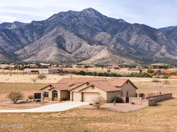 a view of house with mountain view