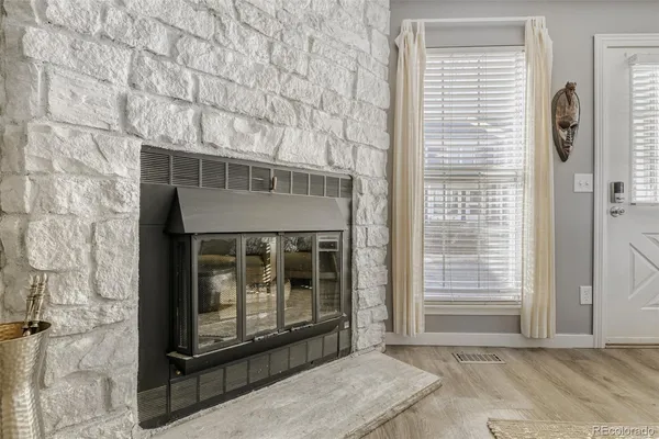 a living room with a fireplace