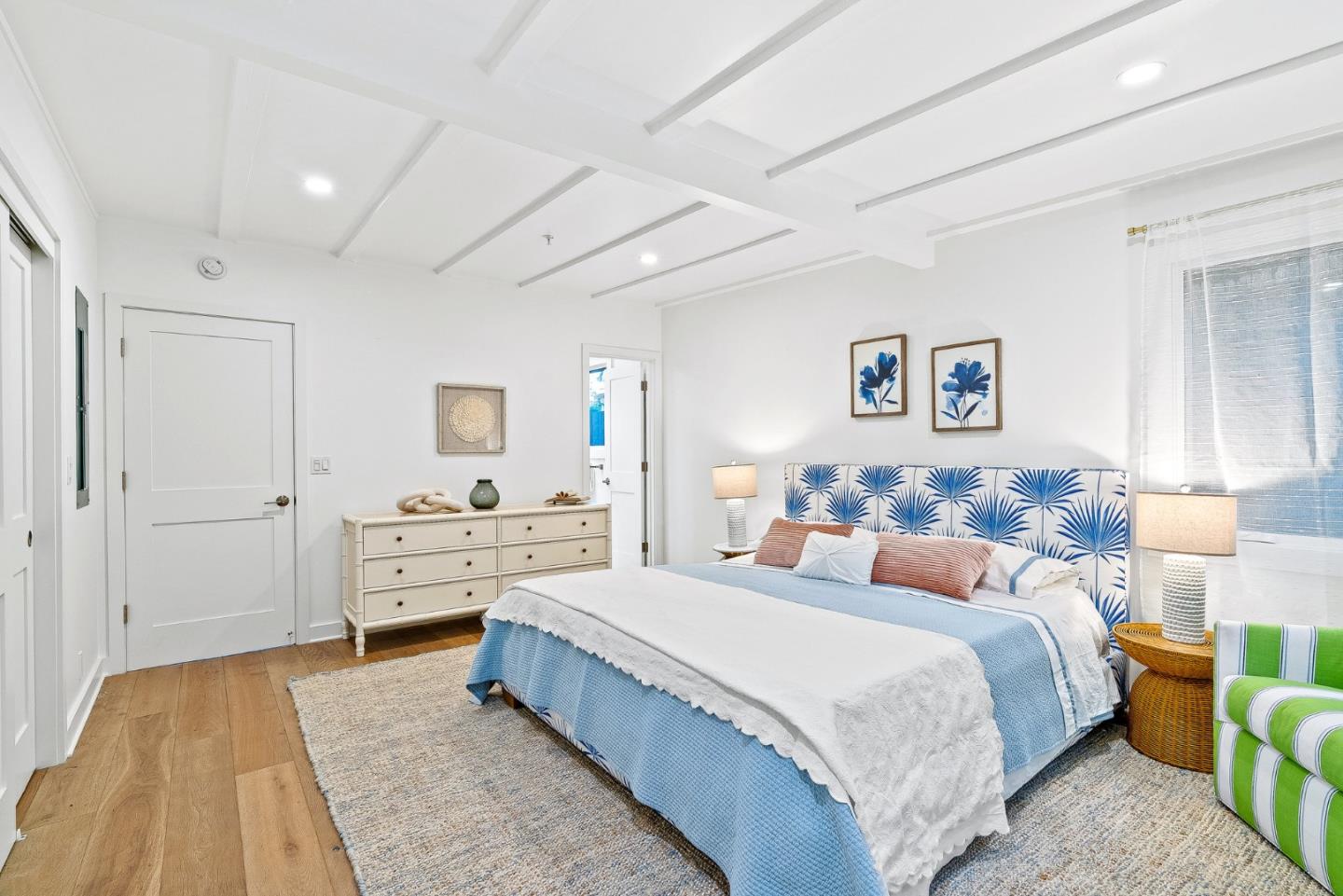 0 Santa Fe 4 Se Of Ocean Avenue Carmel, CA 93923 - Photo 26 of 34 a spacious bedroom with a bed and a couch