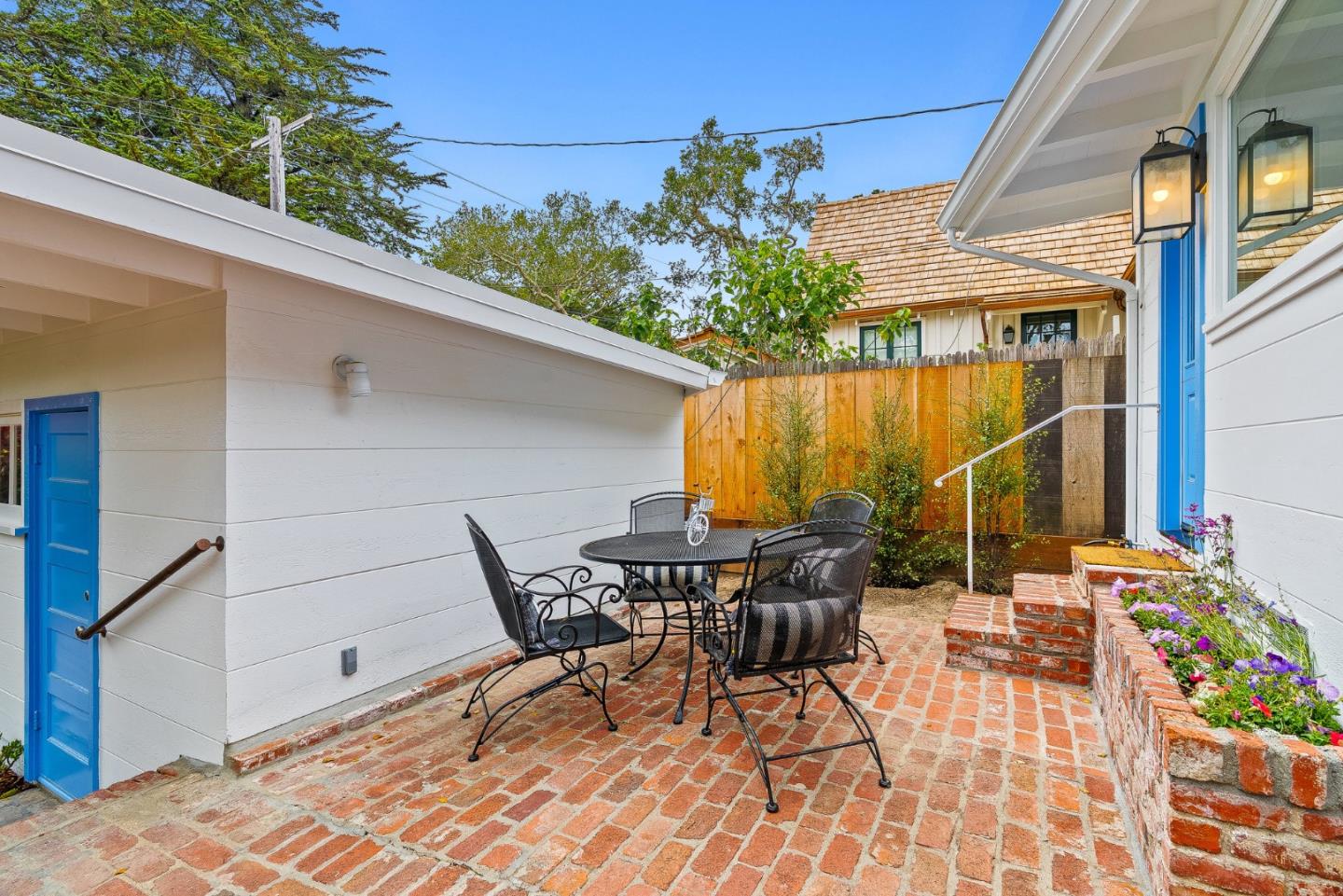 0 Santa Fe 4 Se Of Ocean Avenue Carmel, CA 93923 - Photo 30 of 34 a patio with table and chairs