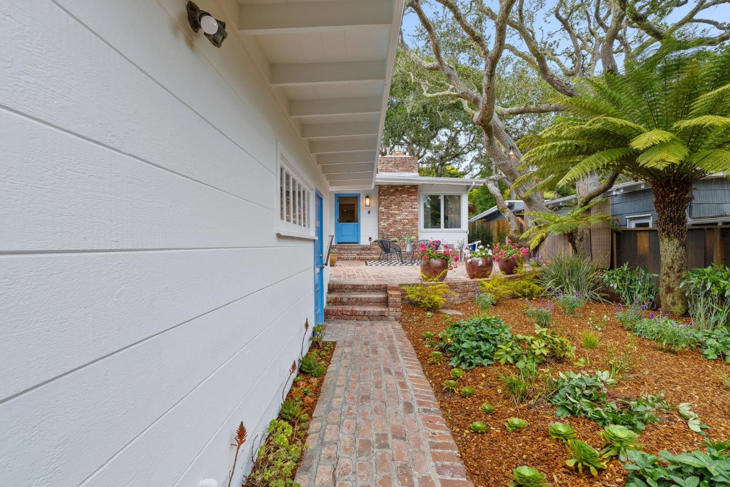 0 Santa Fe 4 Se Of Ocean Avenue Carmel, CA 93923 - Photo 31 of 34 a view of a pathway both side of house