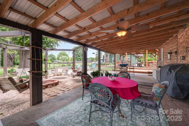 a patio with patio a couch and chairs