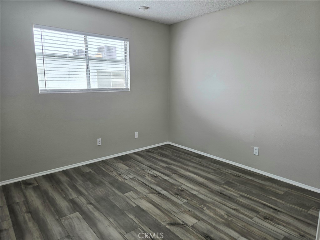 10979 Rincon Street Loma Linda, CA 92354 - Photo 11 of 13 an empty room with a window