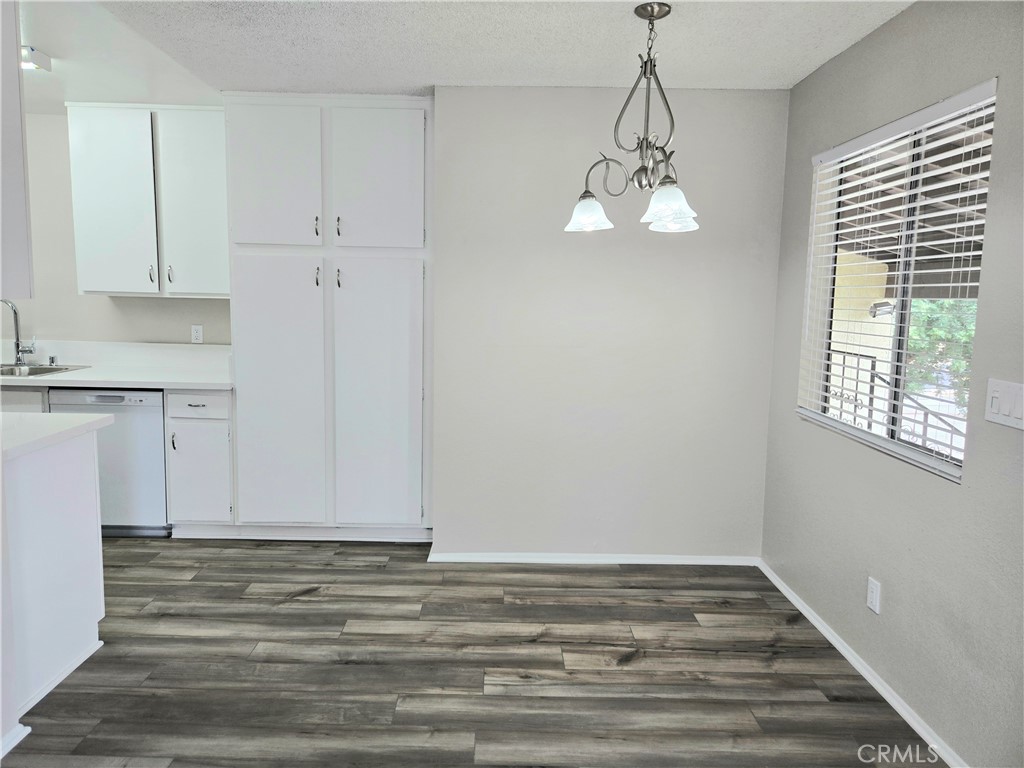 10979 Rincon Street Loma Linda, CA 92354 - Photo 6 of 13 a view of empty room with window and wooden floor