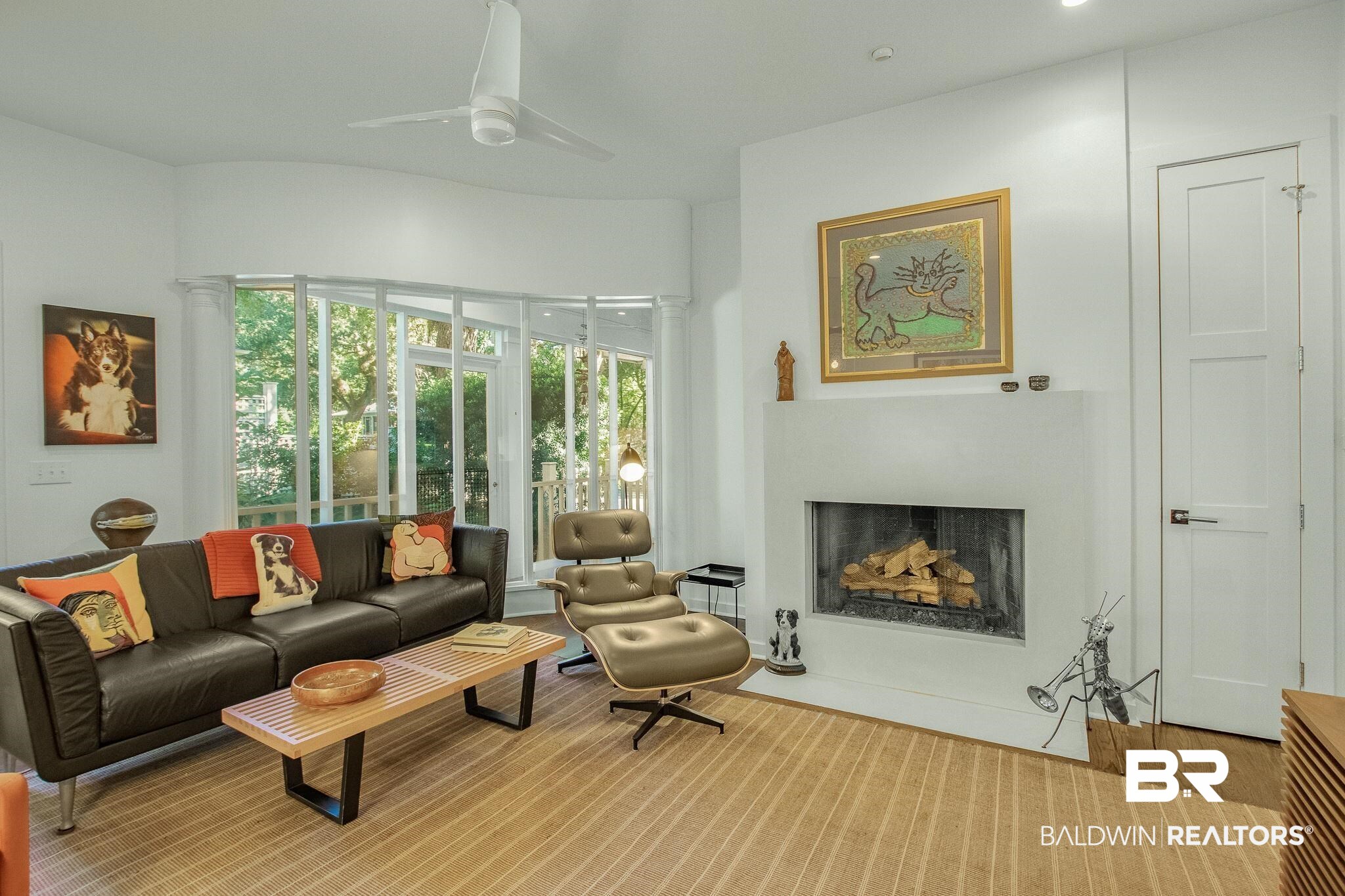 211 Pier Avenue Fairhope, AL 36532 - Photo 31 of 49 gas fireplace, piano glass wall