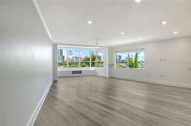 a kitchen with a sink a counter space and stainless steel appliances