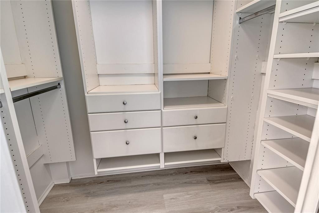 660 Golden Gate Point, Unit 32 Sarasota, FL 34236 - Photo 23 of 52 a view of walk in closet with empty racks