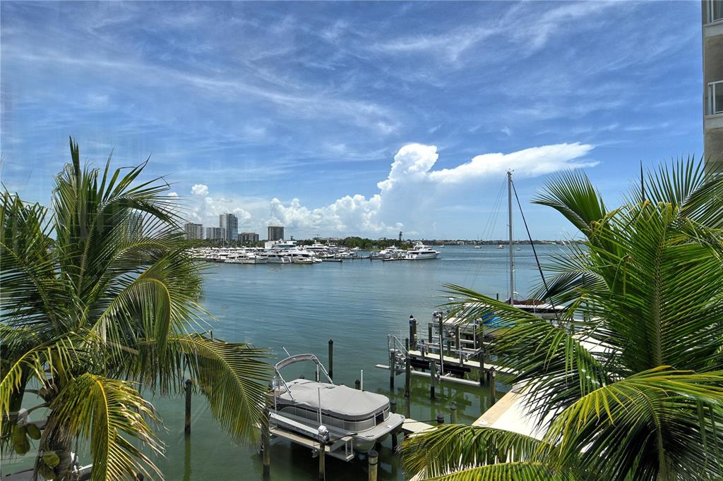 660 Golden Gate Point, Unit 32 Sarasota, FL 34236 - Photo 40 of 52 a view of a lake from a balcony