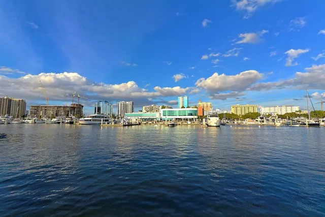 a view of a pool with seating area