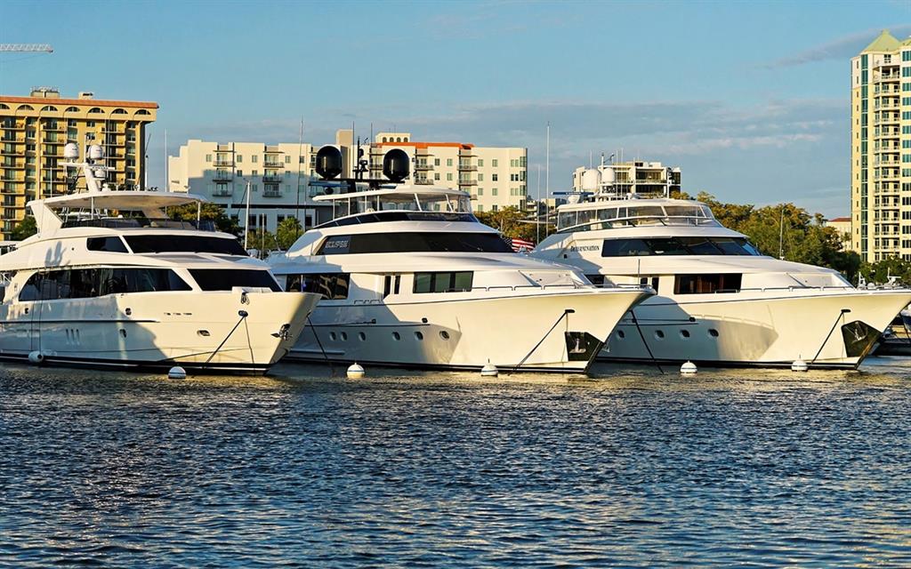 660 Golden Gate Point, Unit 32 Sarasota, FL 34236 - Photo 46 of 52 a view of a pool with seating area