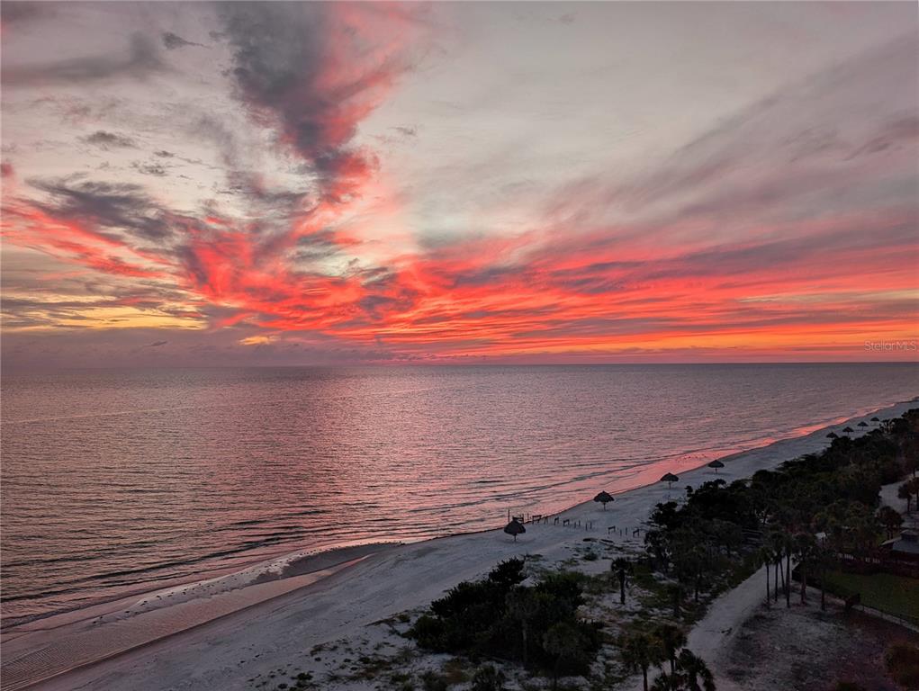 660 Golden Gate Point, Unit 32 Sarasota, FL 34236 - Photo 52 of 54 a view of an ocean and beach