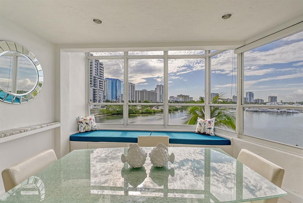 660 Golden Gate Point, Unit 32 Sarasota, FL 34236 - Photo 9 of 52 a large mirror sitting on a table
