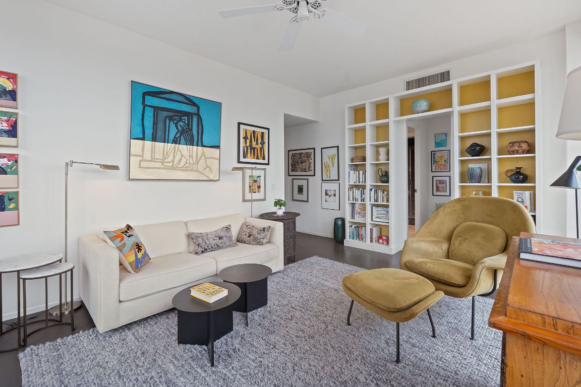 1801 Lavaca Street, Unit 12K Austin, TX 78701 - Photo 4 of 27 a living room with furniture and a table