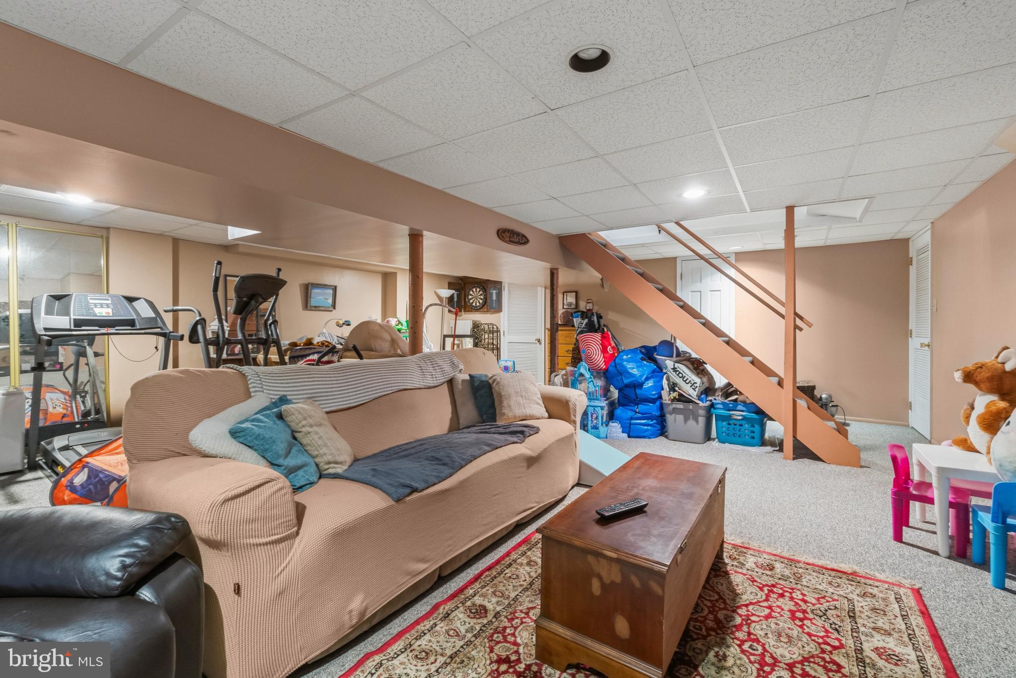 2 Farnham Court Laurel Springs, NJ 08021 - Photo 24 of 33 a living room with furniture and a flat screen tv
