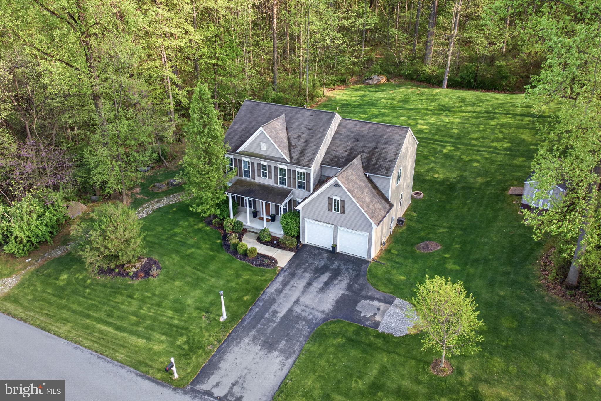 131 Freys Road Elizabethtown, PA 17022 - Photo 1 of 72 a view of a house with a big yard potted plants and large tree