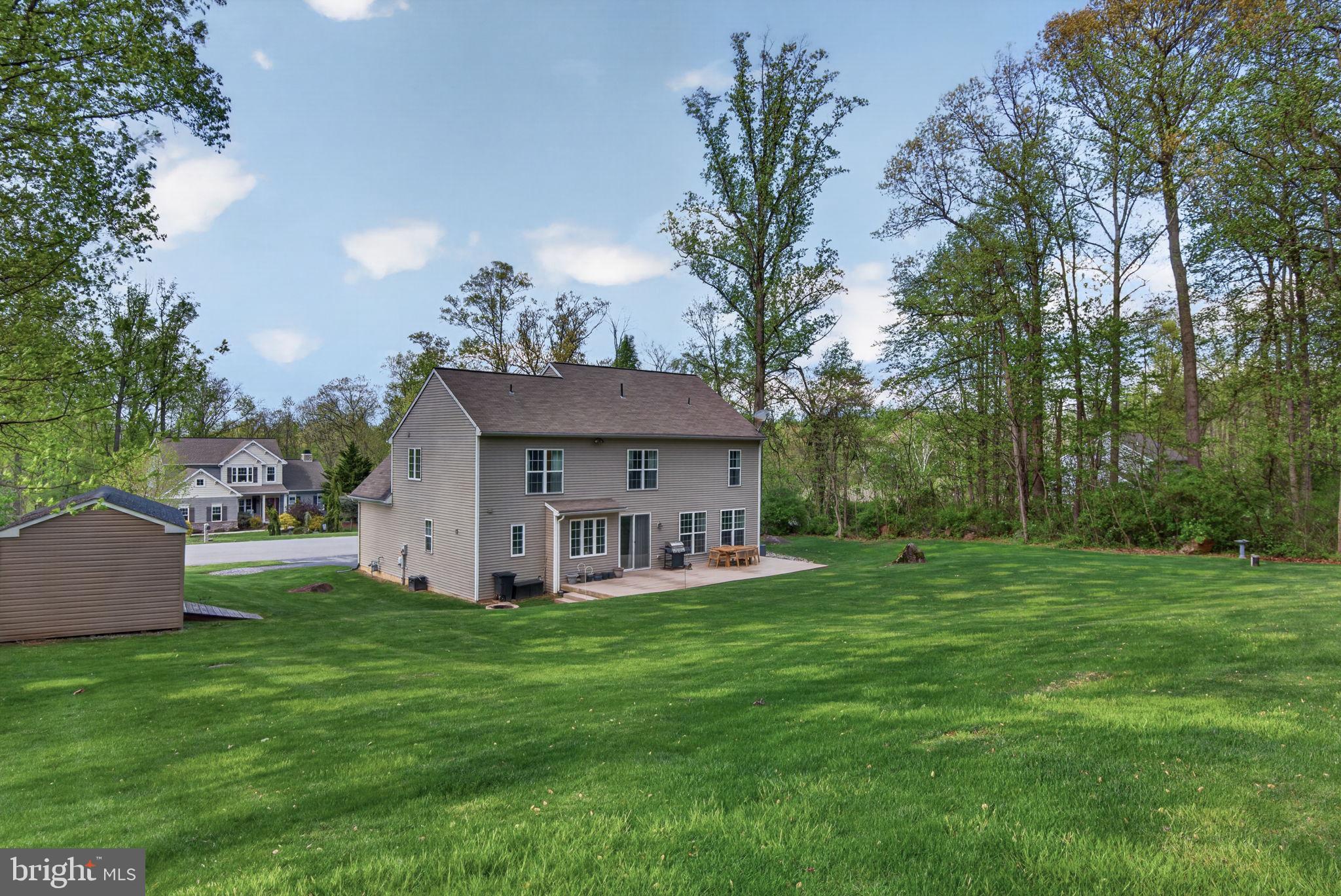 131 Freys Road Elizabethtown, PA 17022 - Photo 14 of 72 a view of a house with a yard and a patio