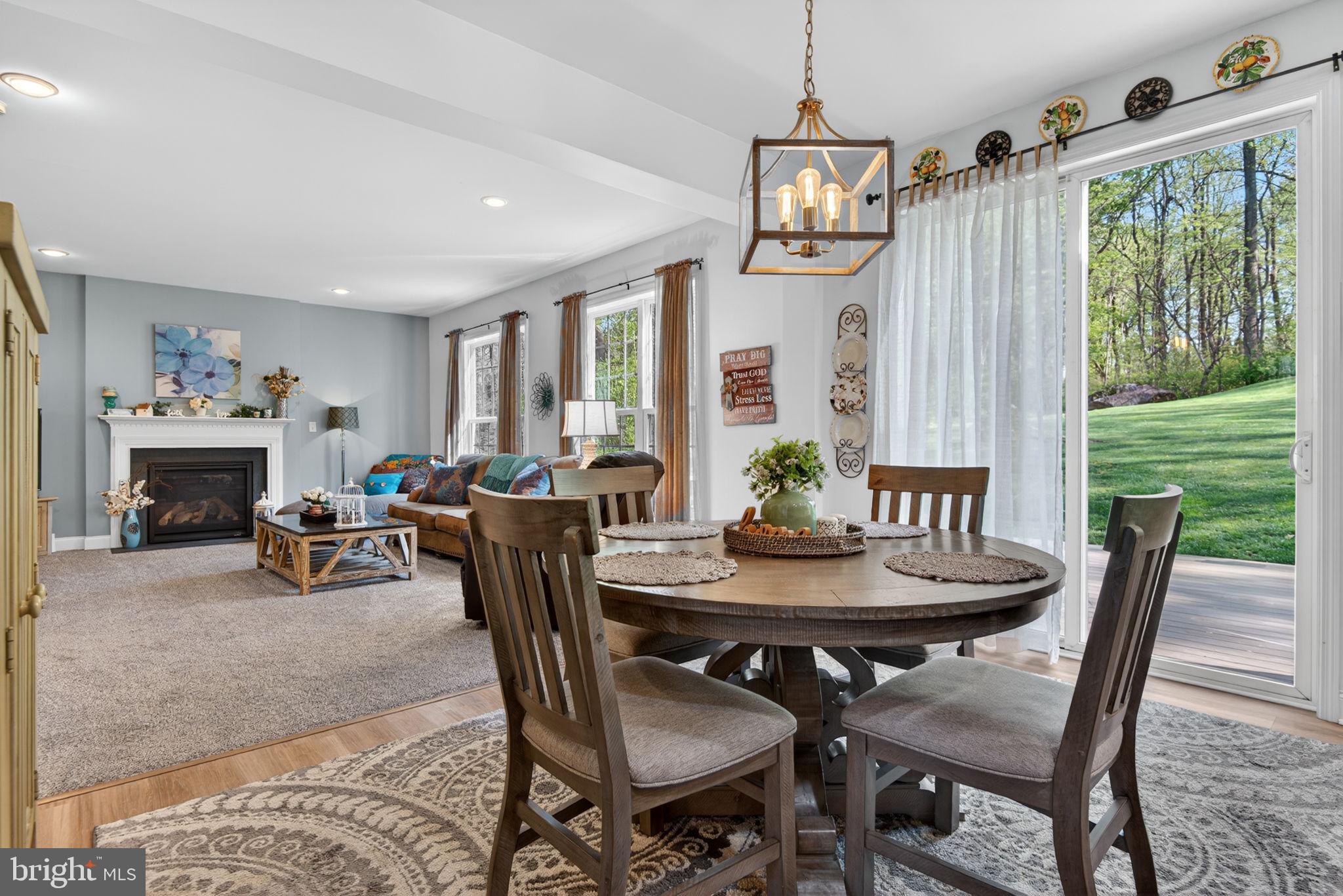 131 Freys Road Elizabethtown, PA 17022 - Photo 38 of 72 a dining room with furniture a chandelier and wooden floor