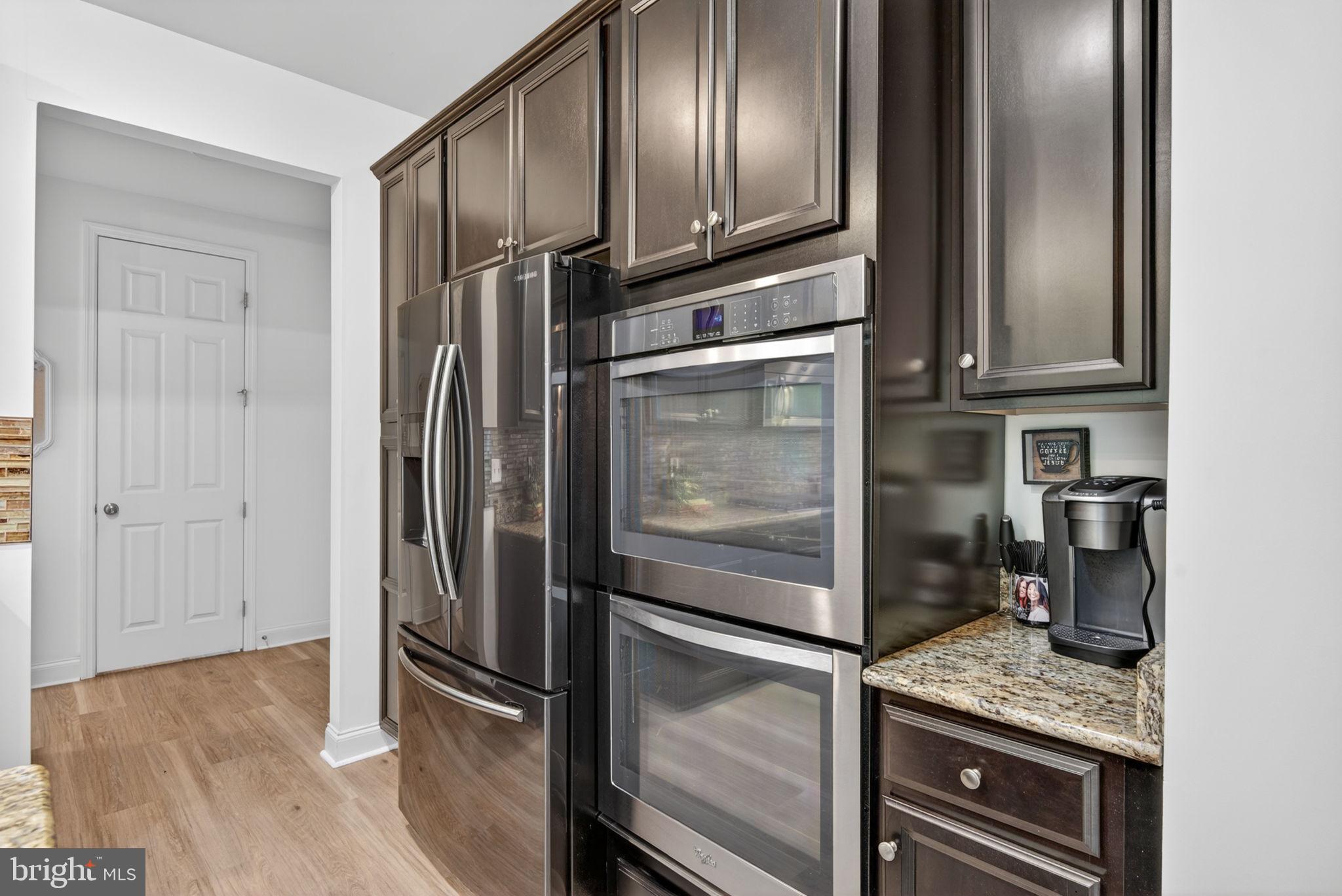 131 Freys Road Elizabethtown, PA 17022 - Photo 44 of 72 a kitchen with stainless steel appliances granite countertop a refrigerator and a stove