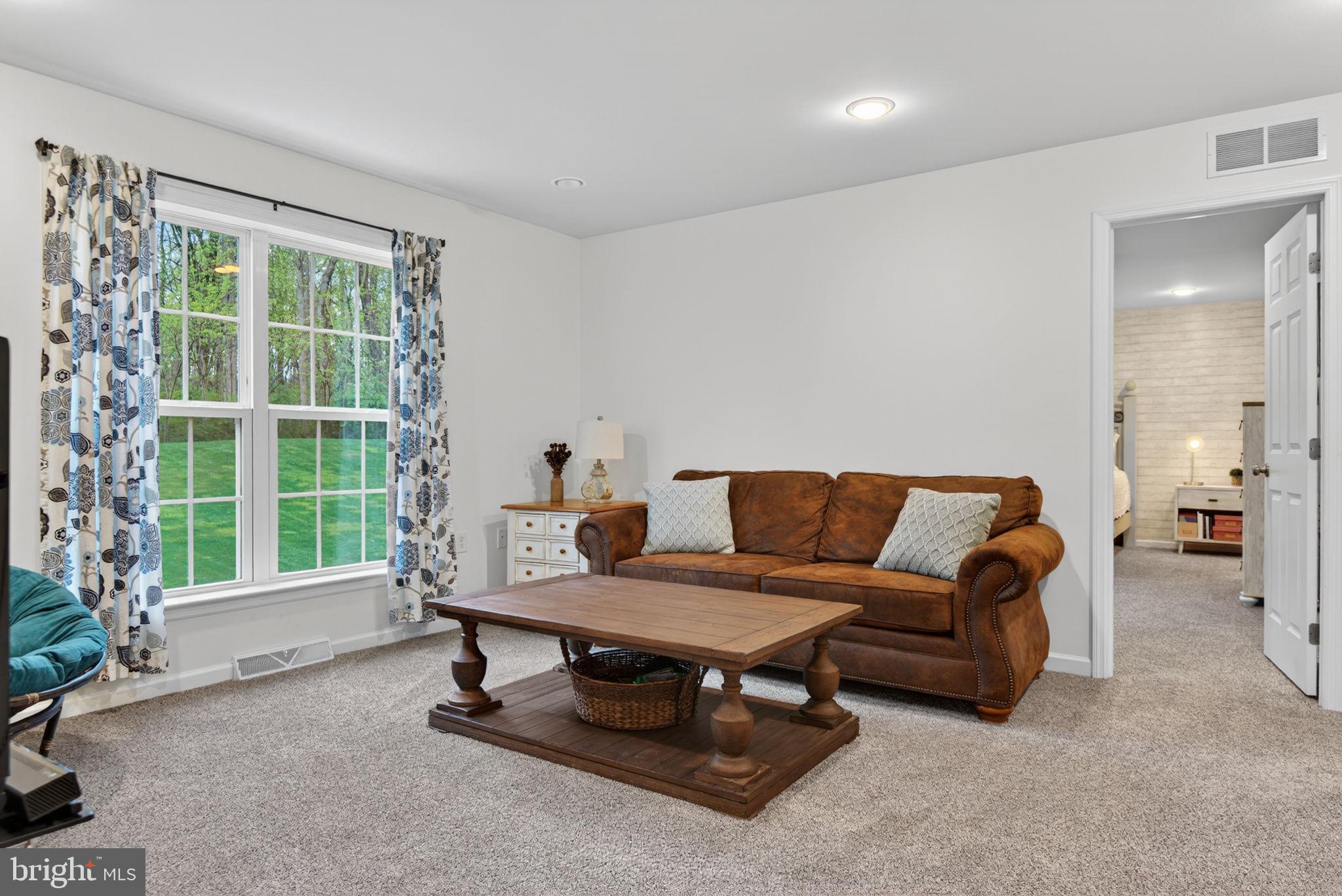 131 Freys Road Elizabethtown, PA 17022 - Photo 52 of 72 a living room with furniture and a window