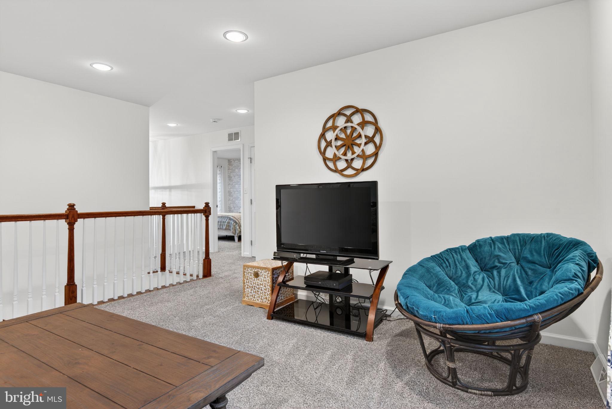 131 Freys Road Elizabethtown, PA 17022 - Photo 54 of 72 a living room with furniture and a flat screen tv