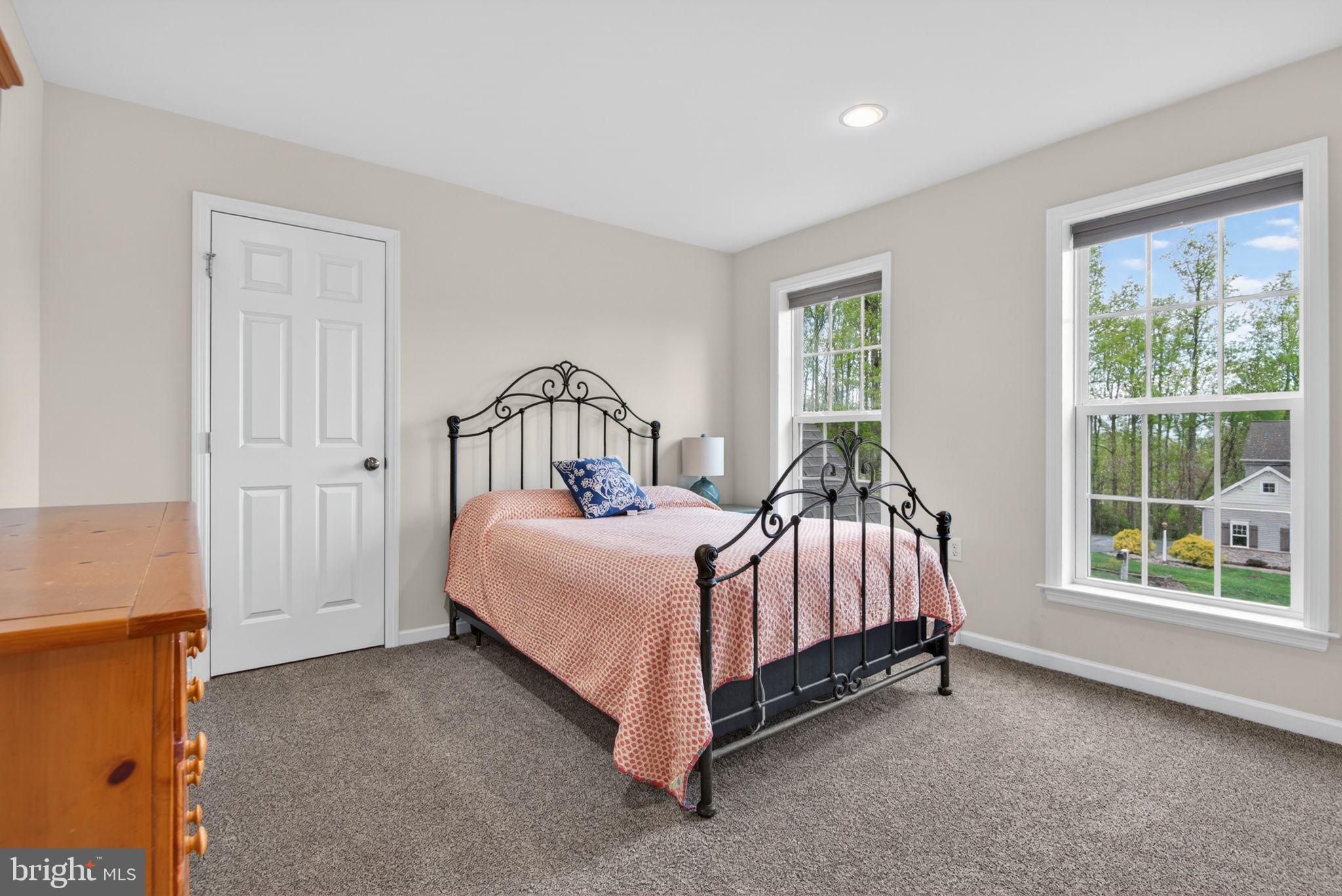 131 Freys Road Elizabethtown, PA 17022 - Photo 63 of 72 a bed sitting in a spacious bedroom next to a window