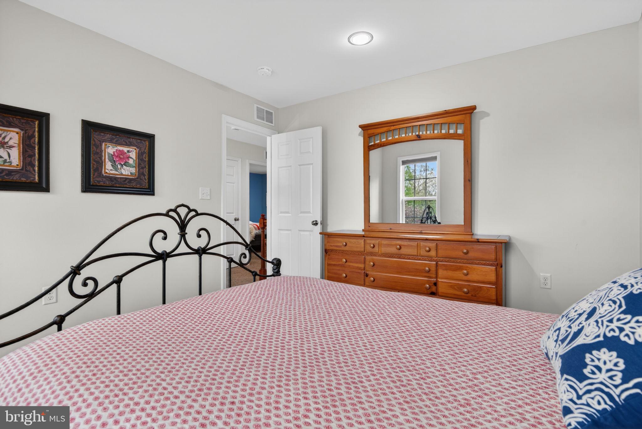 131 Freys Road Elizabethtown, PA 17022 - Photo 64 of 72 a bedroom with a bed and a dresser