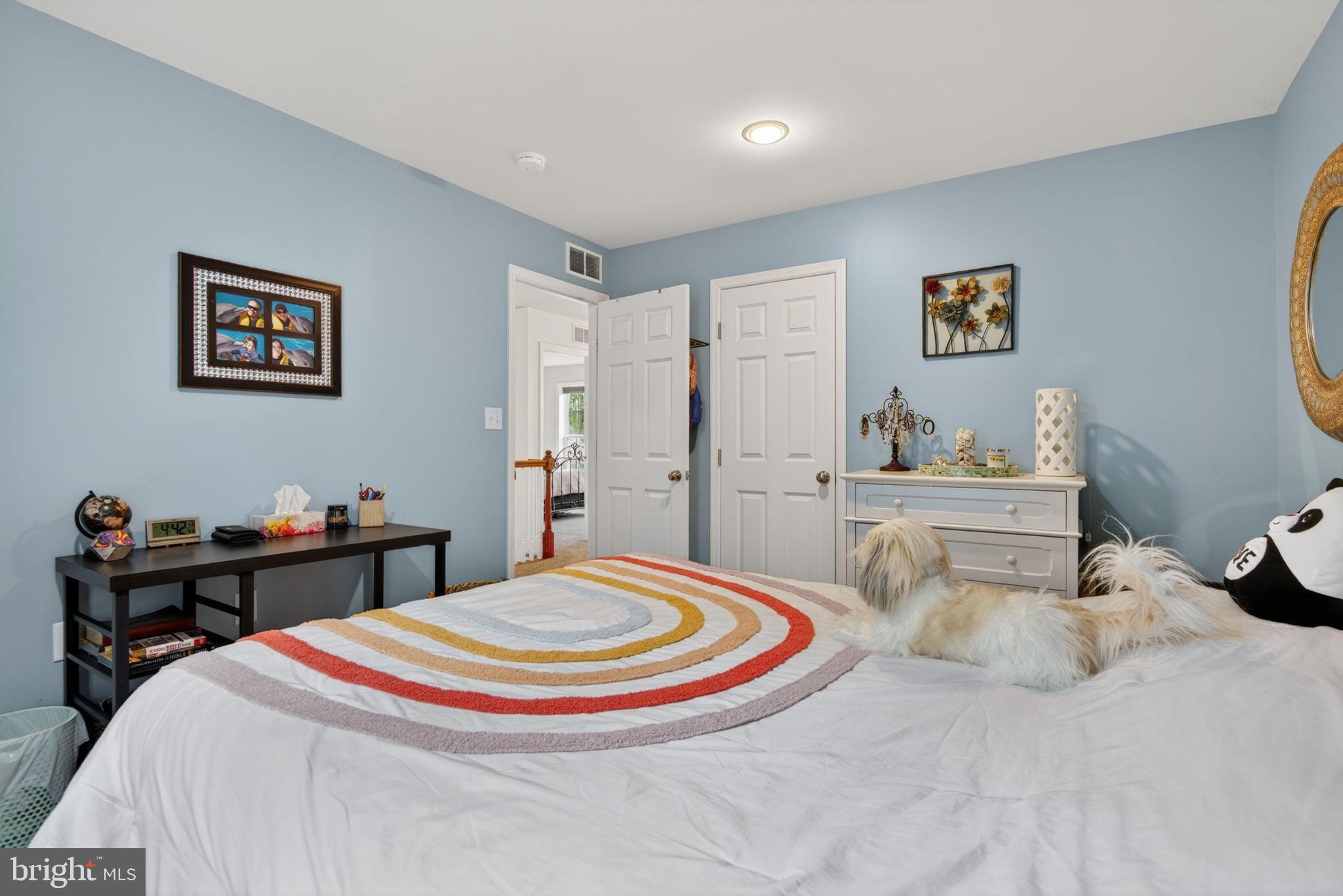 131 Freys Road Elizabethtown, PA 17022 - Photo 68 of 72 a bedroom with a bed and a table in it