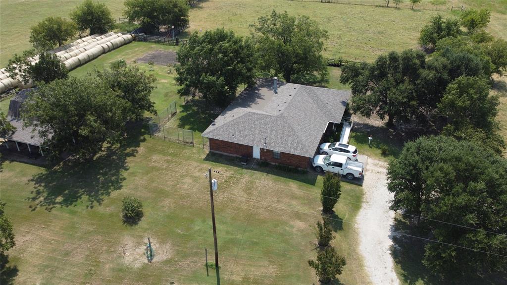 471 Hcr 3335 Road Hubbard, TX 76648 - Photo 37 of 40 an aerial view of a house with a yard and lake view