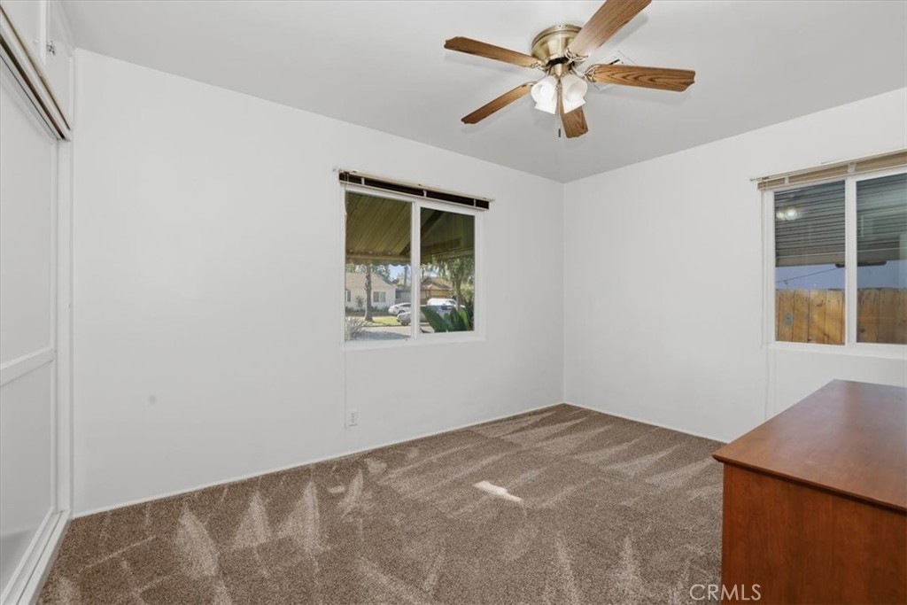 7869 Sycamore Avenue Riverside, CA 92504 - Photo 22 of 36 a view of an empty room with a window