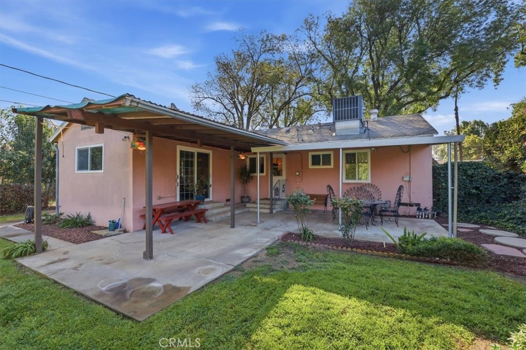 7869 Sycamore Avenue Riverside, CA 92504 - Photo 29 of 36 a view of a house with a yard and sitting area