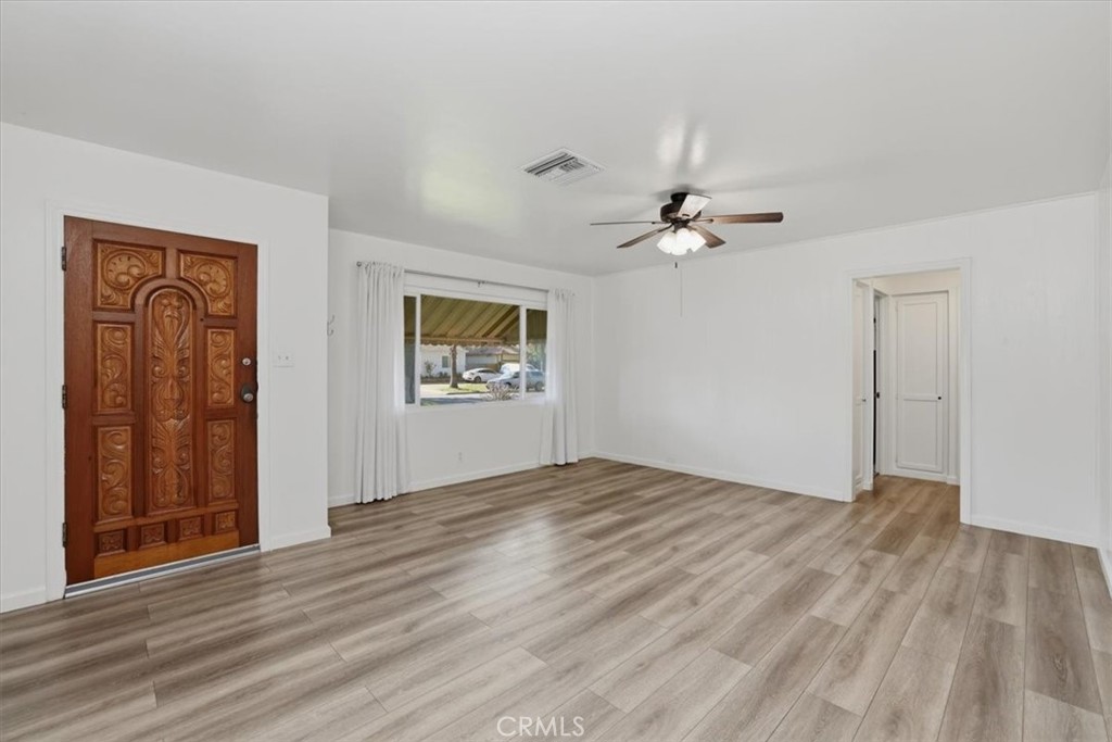 7869 Sycamore Avenue Riverside, CA 92504 - Photo 6 of 36 a view of an empty room with a window