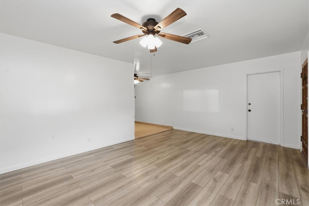 7869 Sycamore Avenue Riverside, CA 92504 - Photo 10 of 36 wooden floor in an empty room