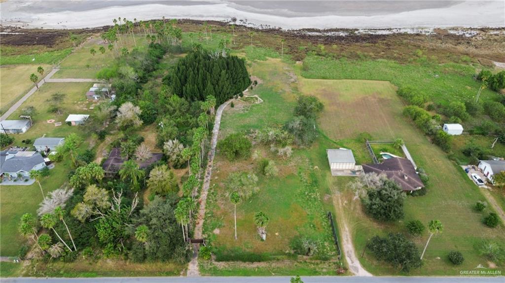 27246 McLelland Road Harlingen, TX 78552 - Photo 4 of 10 a view of a lake with a yard
