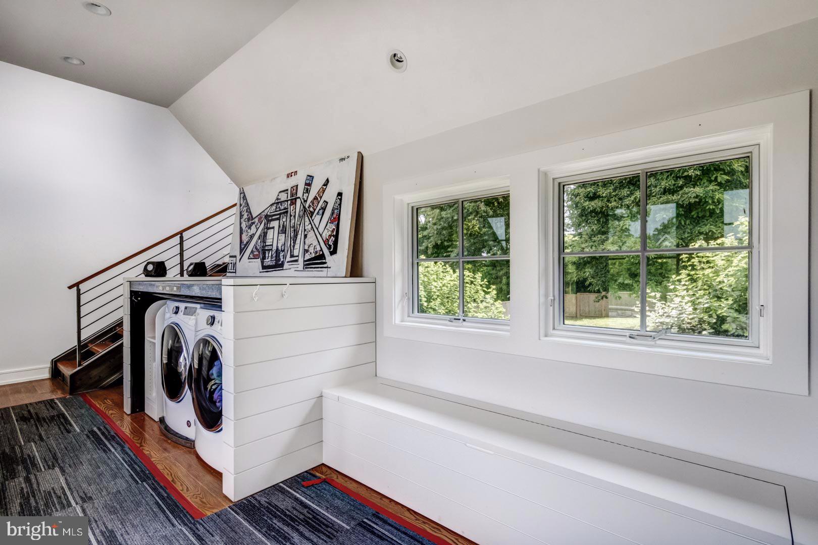 609 St Andrews Road Philadelphia, PA 19118 - Photo 14 of 31 a utility room with wooden floor washer and dryer