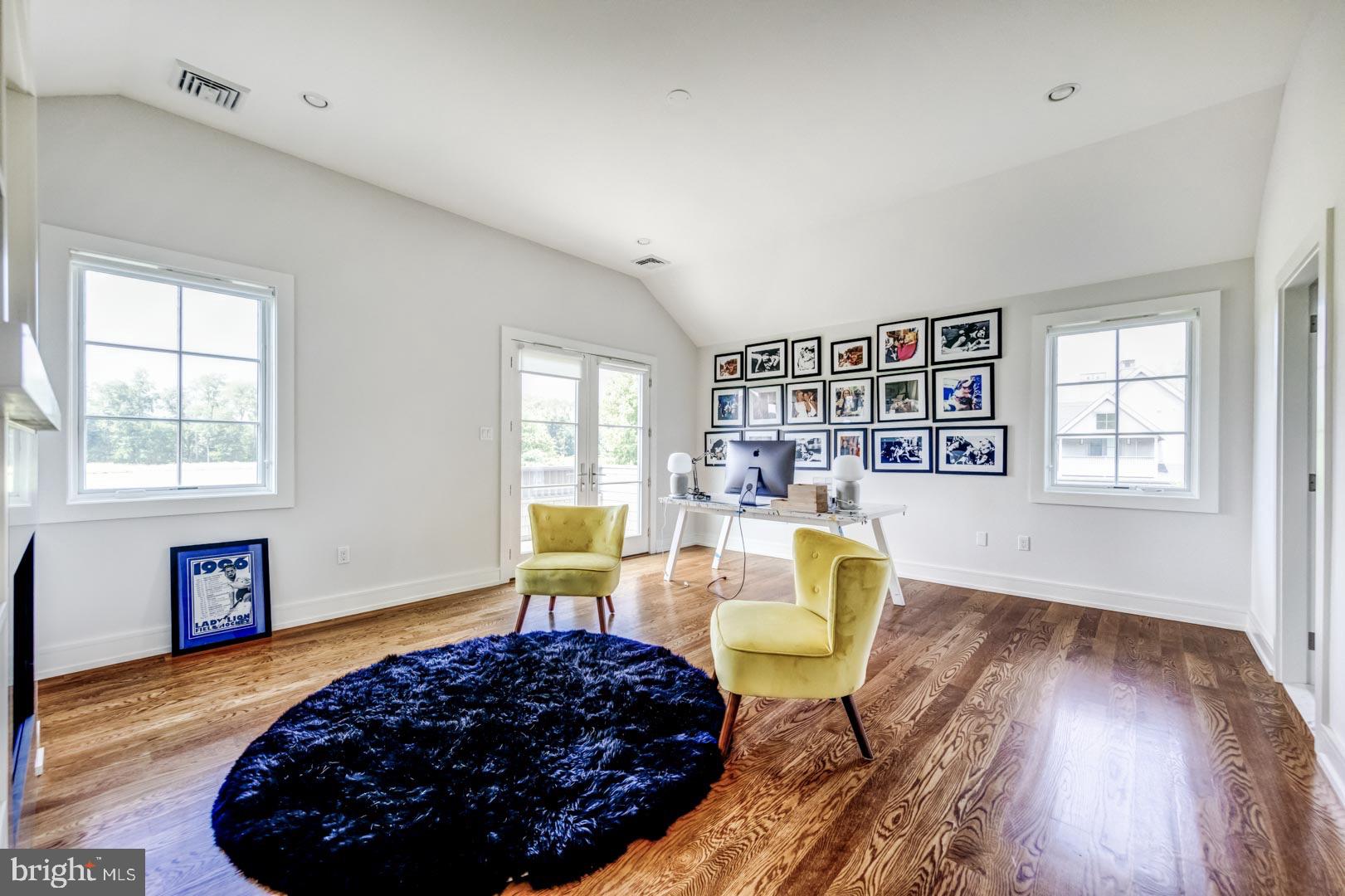 609 St Andrews Road Philadelphia, PA 19118 - Photo 21 of 31 a living room with furniture and a wooden floor