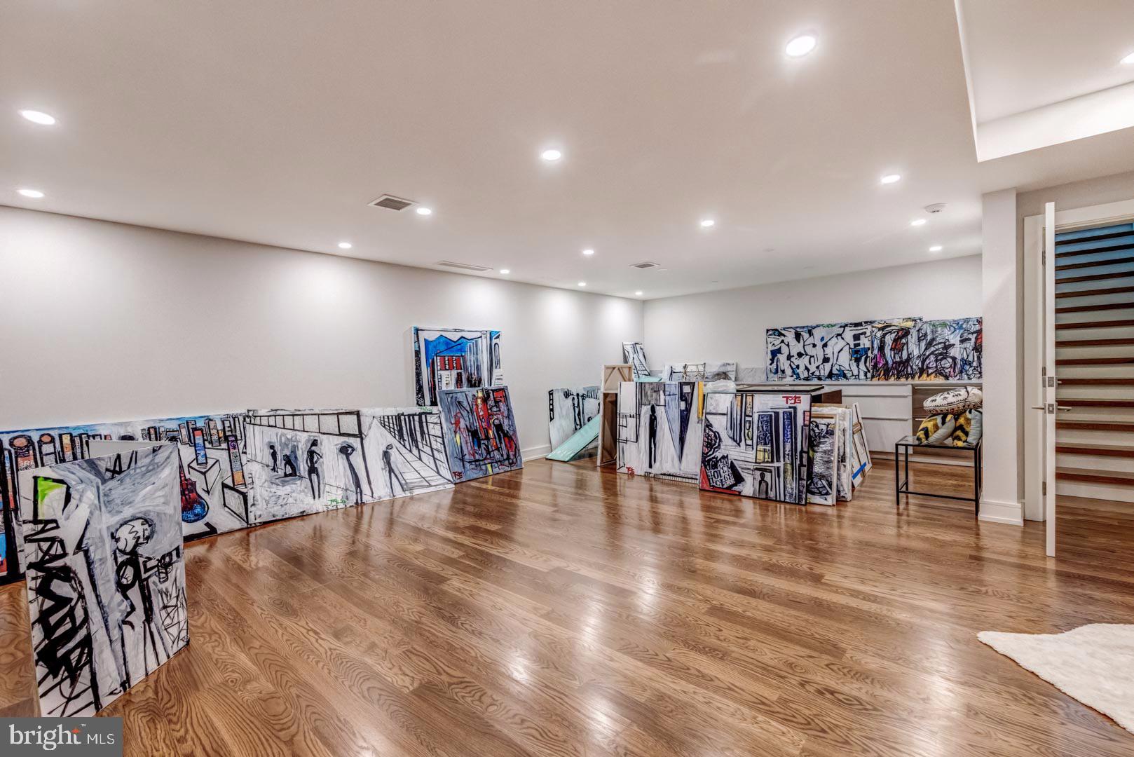 609 St Andrews Road Philadelphia, PA 19118 - Photo 25 of 31 a view of a room with lots of gym equipment