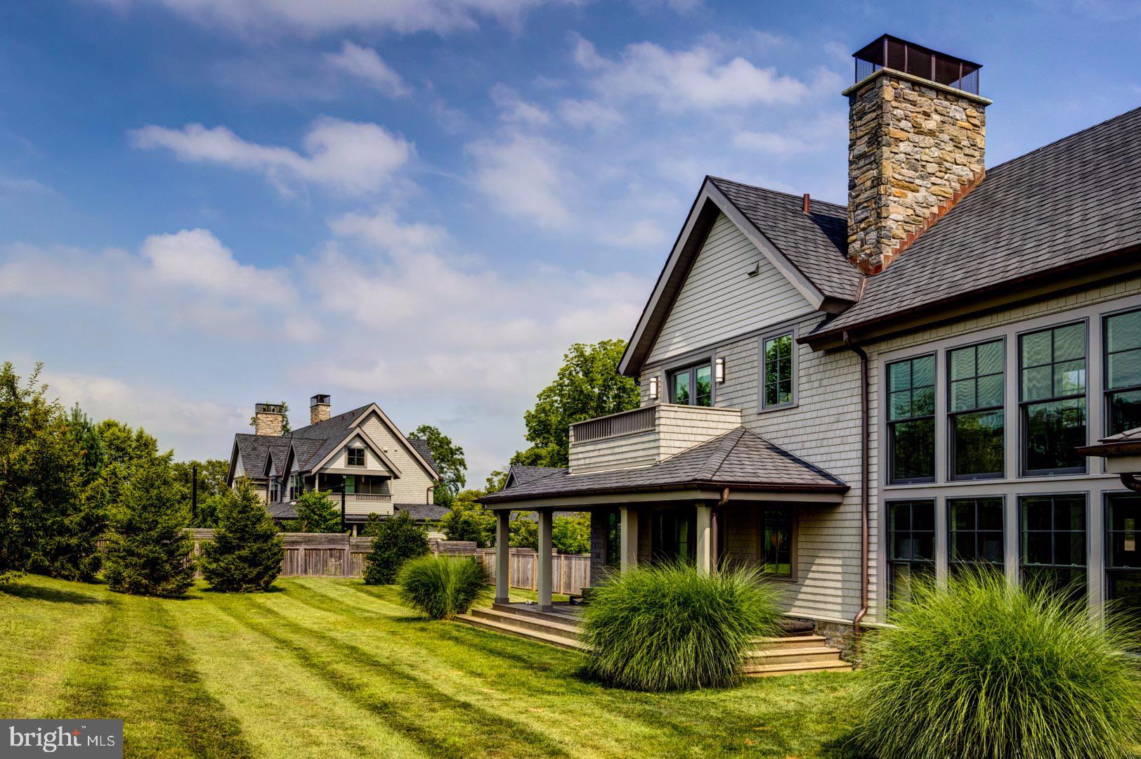 609 St Andrews Road Philadelphia, PA 19118 - Photo 30 of 31 a front view of a house with a garden