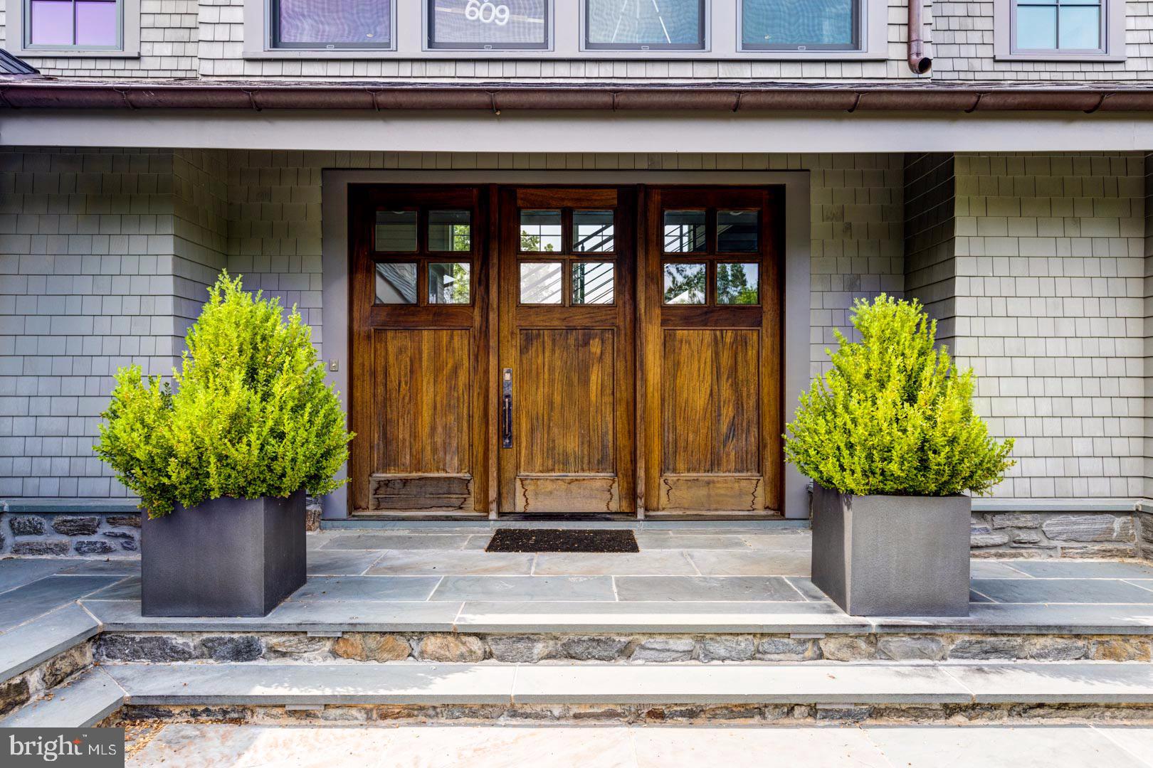 609 St Andrews Road Philadelphia, PA 19118 - Photo 3 of 31 a potted plant sitting on the side of a building