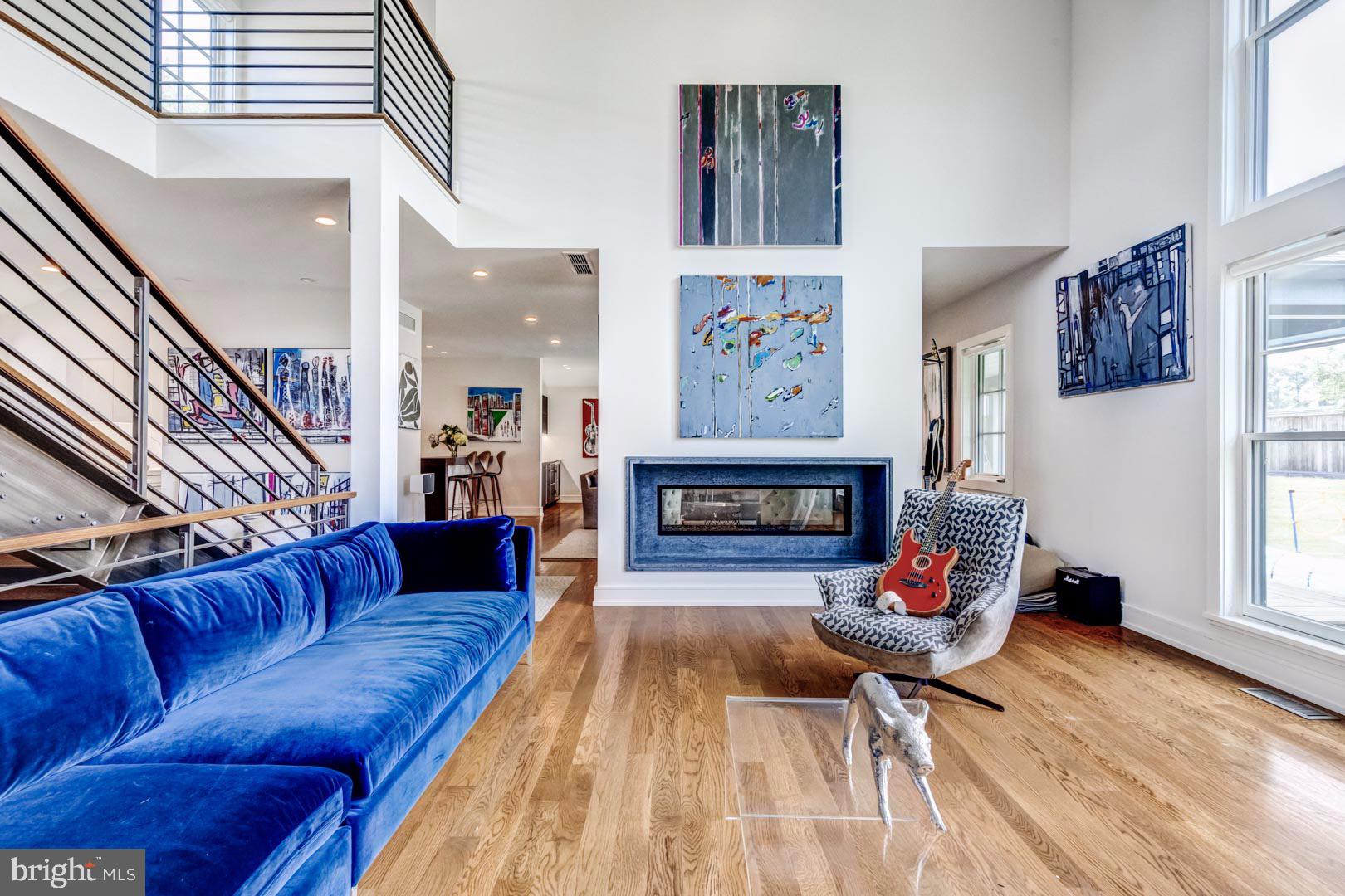 609 St Andrews Road Philadelphia, PA 19118 - Photo 4 of 31 a living room with furniture and a fireplace