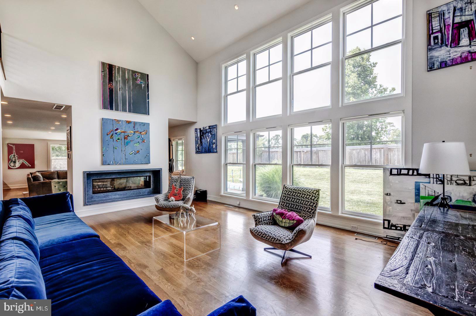 609 St Andrews Road Philadelphia, PA 19118 - Photo 5 of 31 a living room with furniture large window and flat screen tv