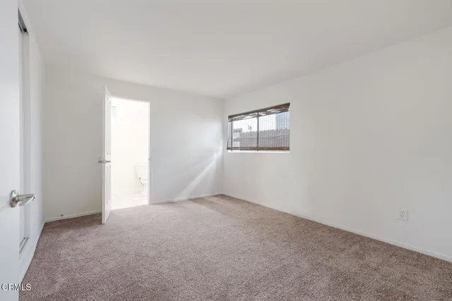 a view of cabinets and hallway