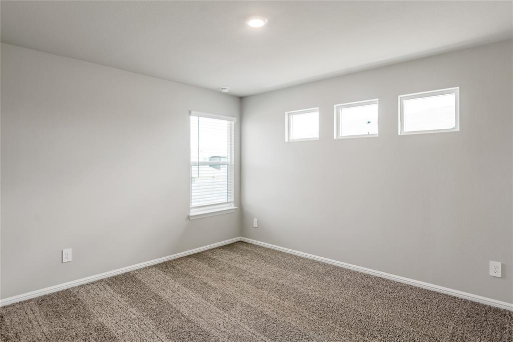 3137 Pecan Farm Lane Fort Worth, TX 76140 - Photo 11 of 31 an empty room with a window