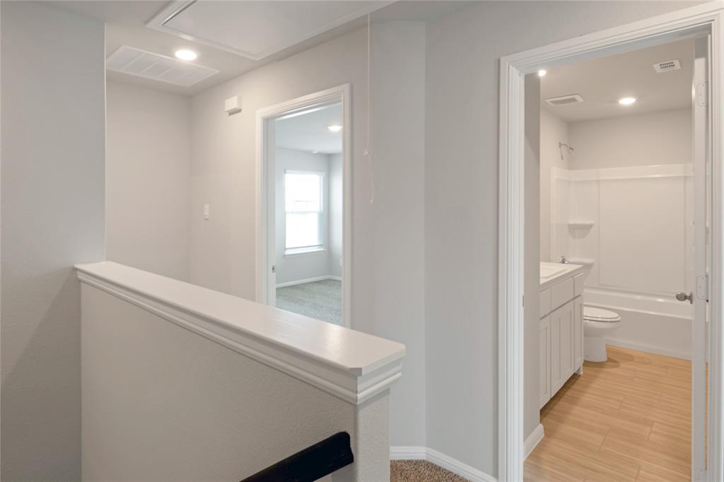 3137 Pecan Farm Lane Fort Worth, TX 76140 - Photo 25 of 31 a bathroom with a sink and a toilet