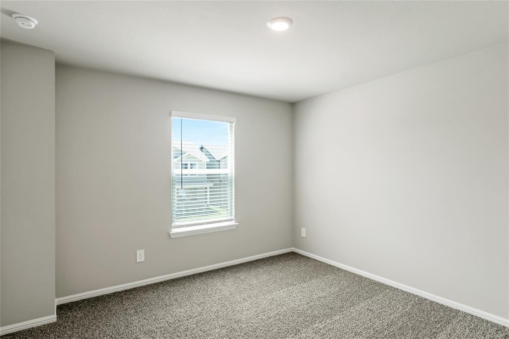 3137 Pecan Farm Lane Fort Worth, TX 76140 - Photo 26 of 31 an empty room with a window