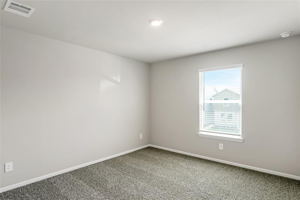 3137 Pecan Farm Lane Fort Worth, TX 76140 - Photo 28 of 31 an empty room with a window
