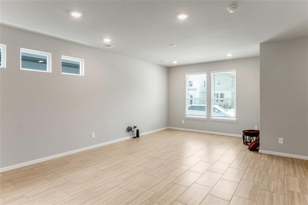 3137 Pecan Farm Lane Fort Worth, TX 76140 - Photo 4 of 31 a view of an empty room with a window