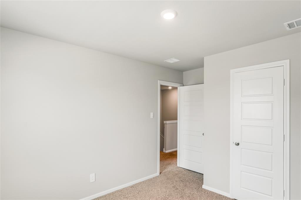 3137 Pecan Farm Lane Fort Worth, TX 76140 - Photo 7 of 31 a view of an empty room
